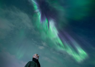 Vivid green and purple Northern Lights above Iceland
